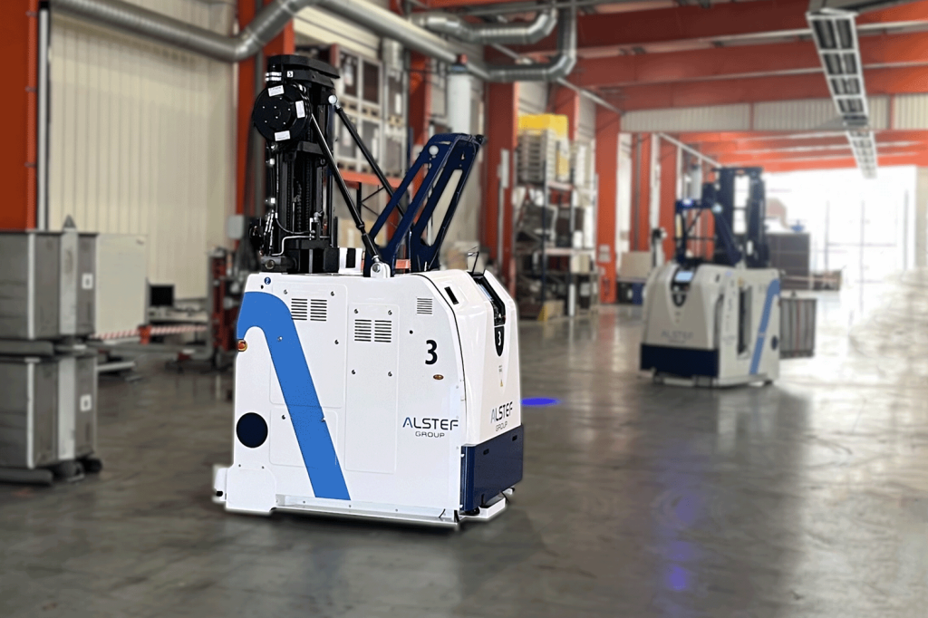 AGVs transporting cheese wheels for Entremont - Alstef Group